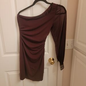 One shoulder form fitting mini dress.